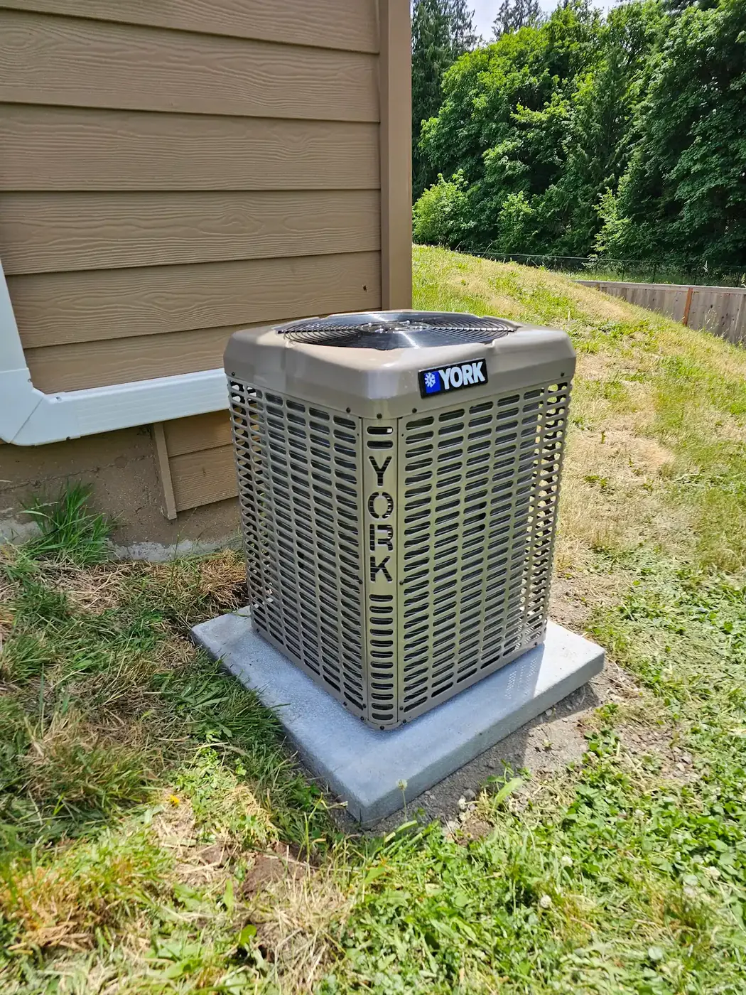 York central AC condenser installation on a new concrete pad in Vancouver, WA