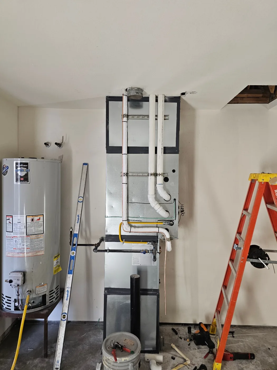 High-efficiency furnace and coil with new PVC venting installed in Vancouver, WA by Imperial Heating and Cooling