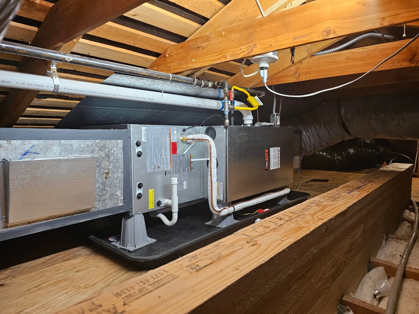 RunTru attic air handler on a condensate pan with new line set in Vancouver, WA